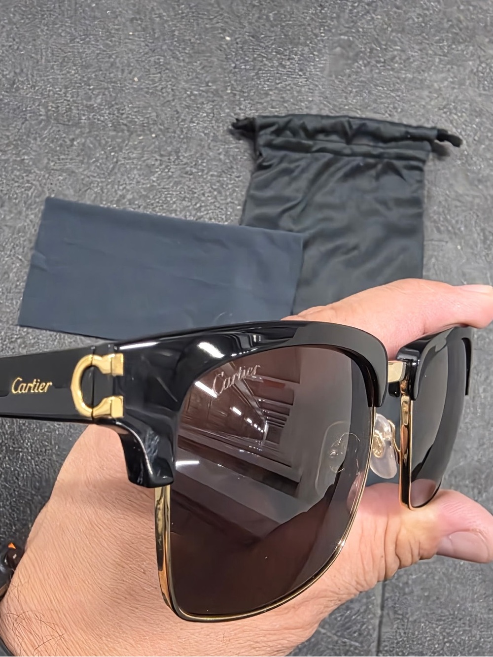 Cartier Black and Gold Designer Sunglasses with Brown Lenses